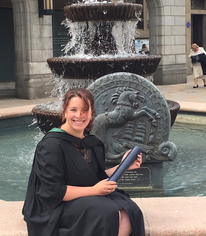 Alexis by a fountain