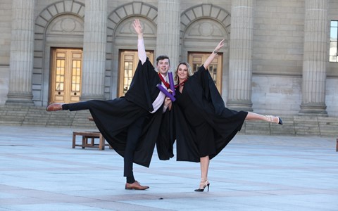 Dance students posing at caird hall for graduation