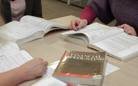 students with accounting books