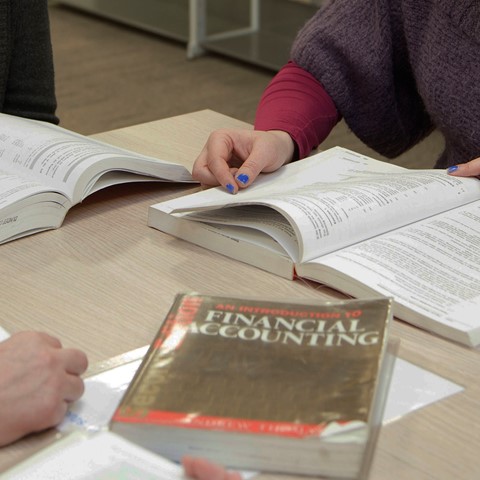 students with accounting books