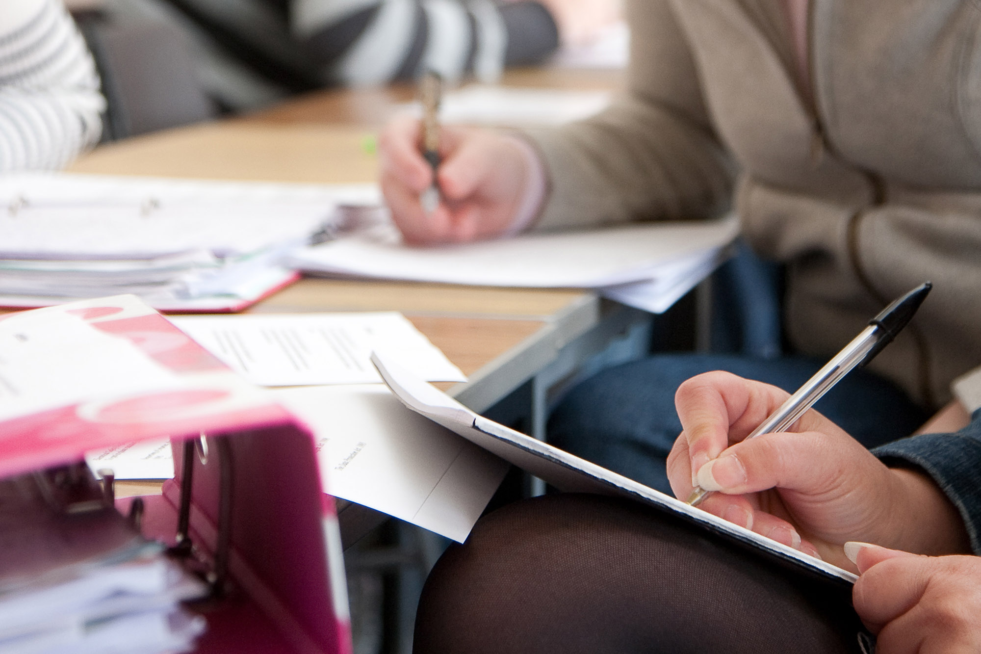 students filling out paperwork