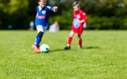 Holiday Sports – Two Football Students
