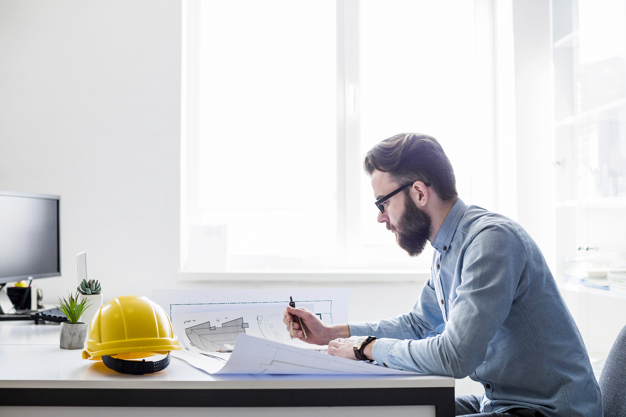 man working at desk