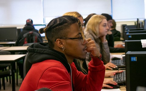 Students working on computers