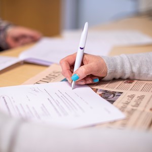 Student filling in documents