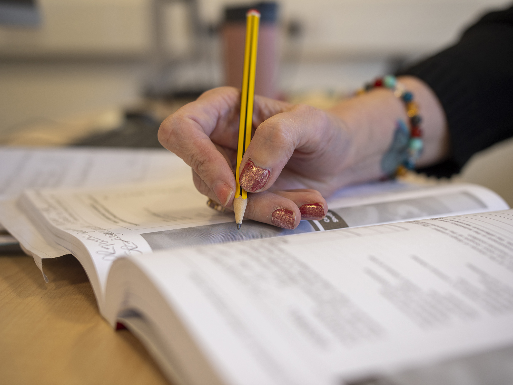 business student filling in paperwork