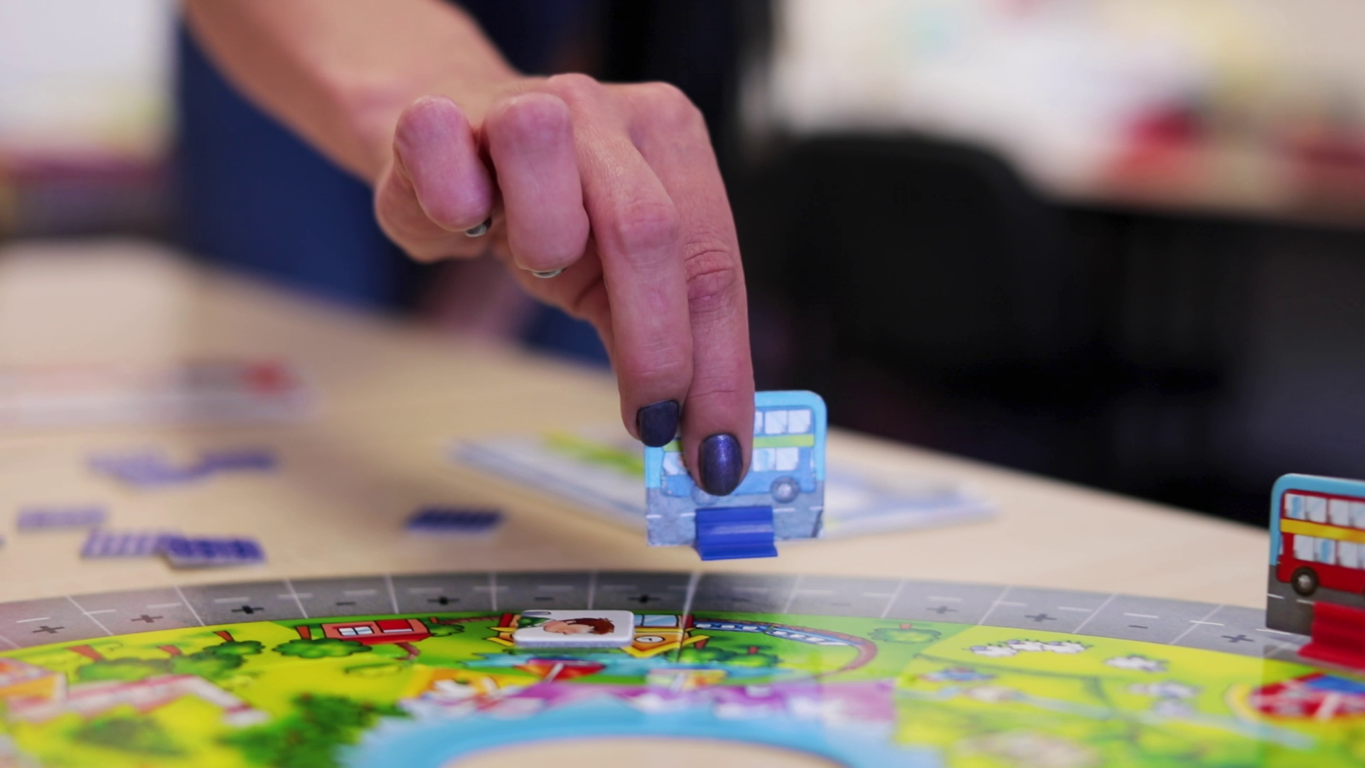 child care student playing board game