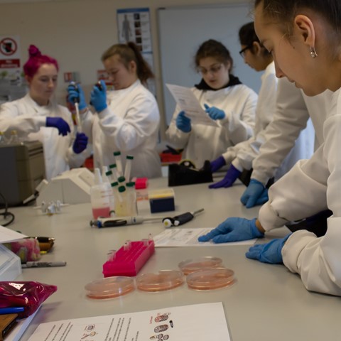 science students and equipment