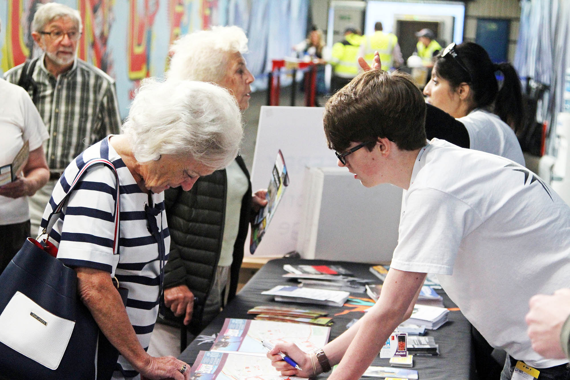 students guiding tourists