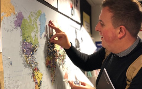 A student look at a map