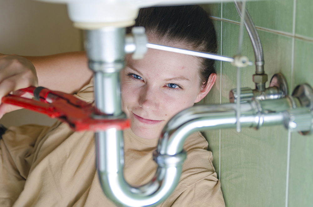 Female student plumber