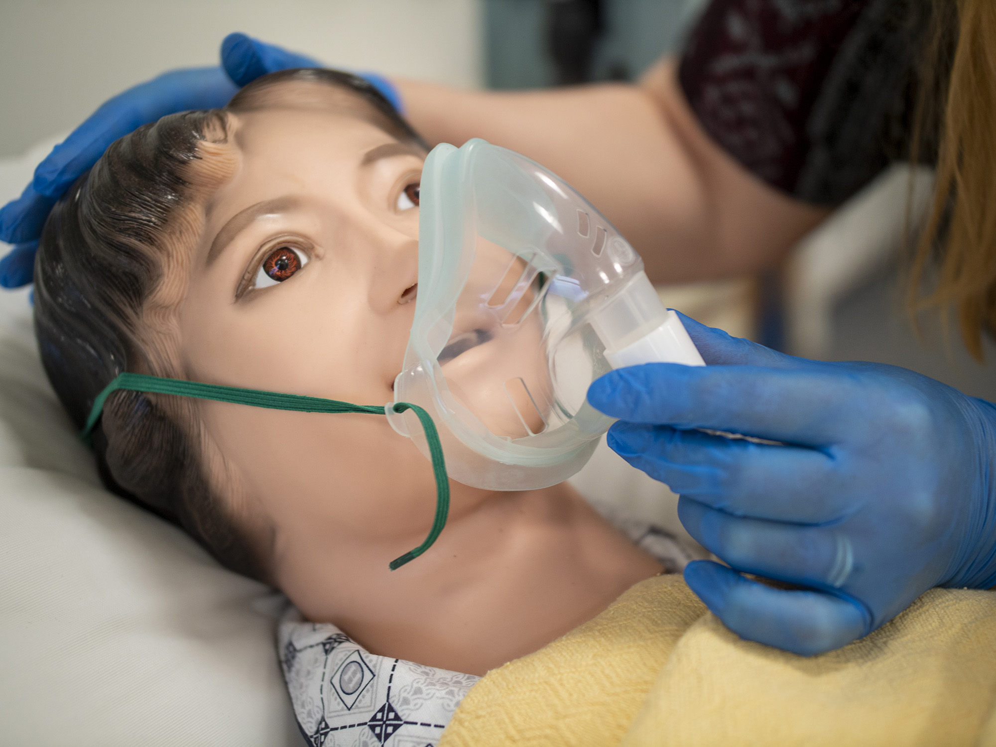student working on training dummy