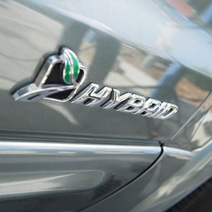 Hybrid car badge and boot