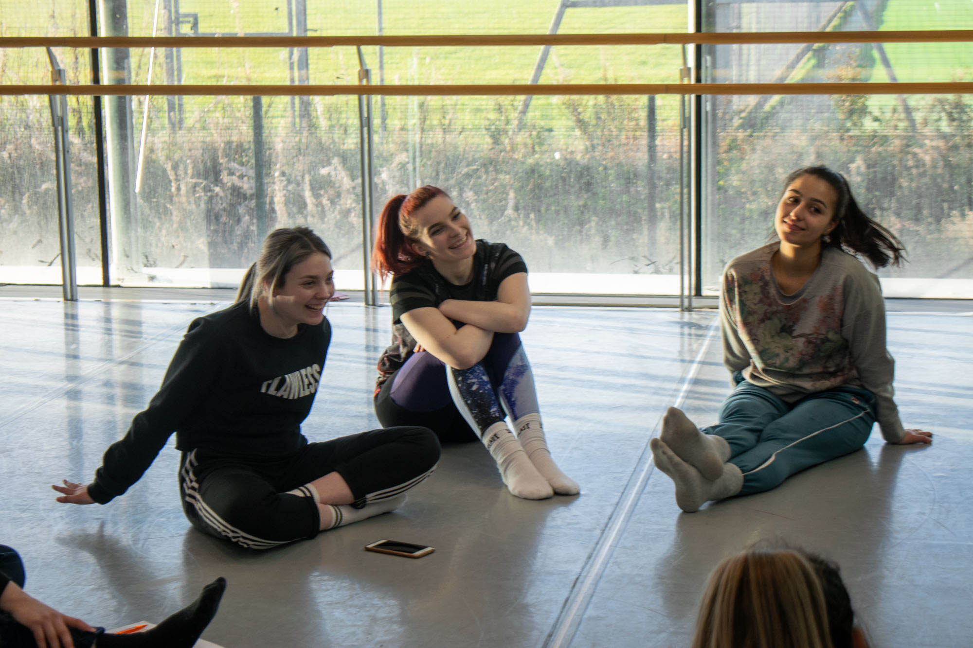 Performing Arts students sitting in studio