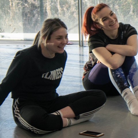Performing Arts students sitting in studio
