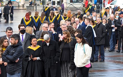 queue of people in City Square