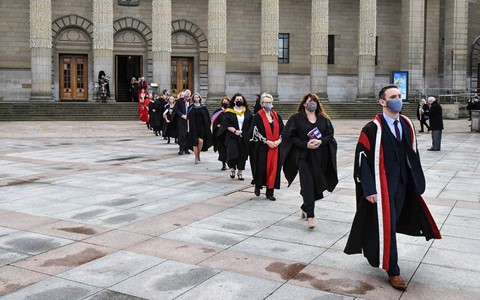 platform party leaving Caird Hall across City Square