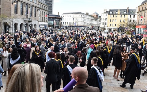 graduates and guests in City Square
