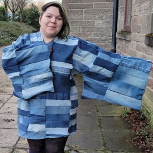 Textiles Student wearing reclaimed Denim dress on display at the V&A