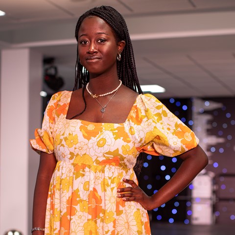 Fashion Show Student posing on the runway