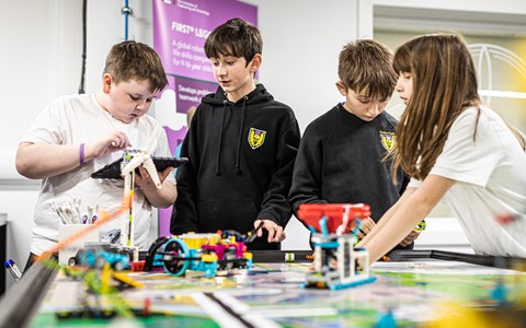 School children with Lego