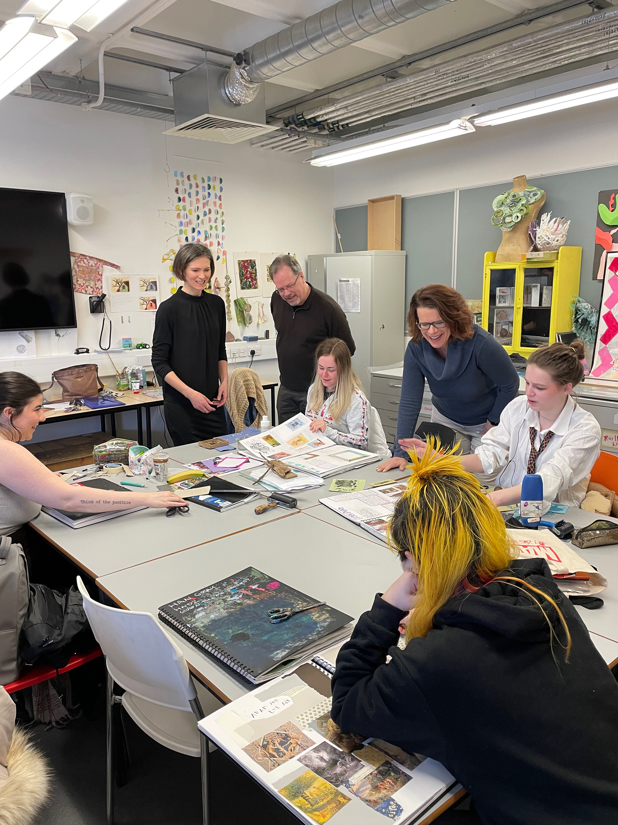 Staff from NOVA college working with Dundee and Angus College students