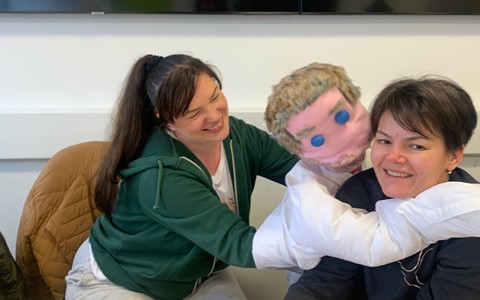 HND Childcare students with puppet