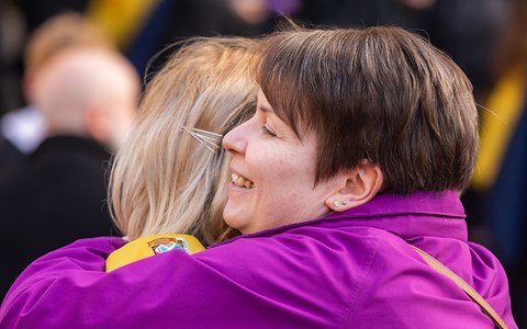 graduating student celebrating