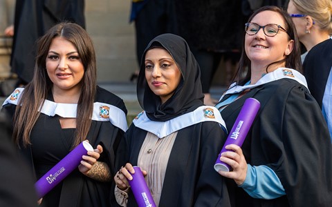 graduating students celebrating