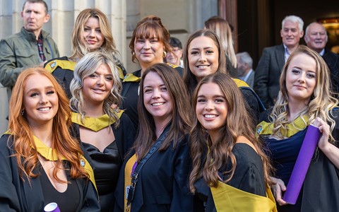 graduating students celebrating