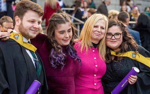 graduating students celebrating