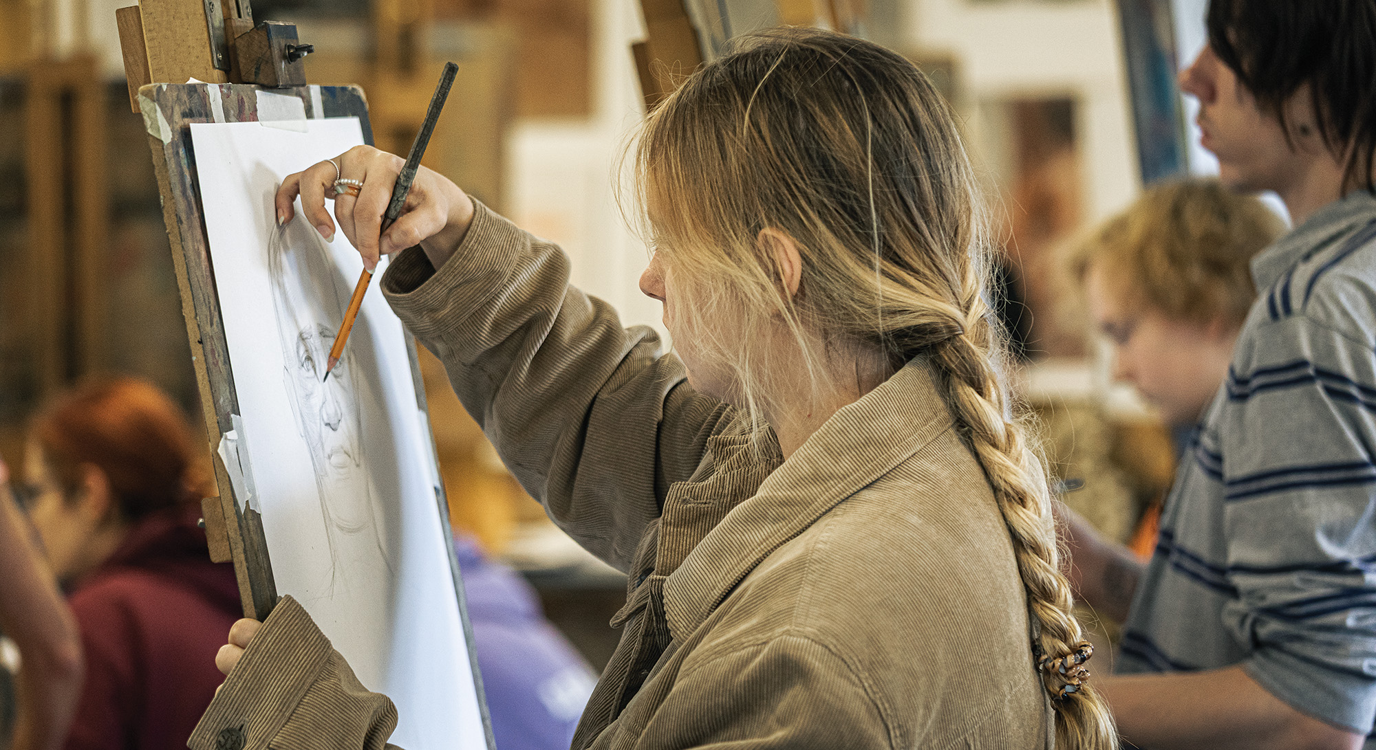 Student drawing portrait