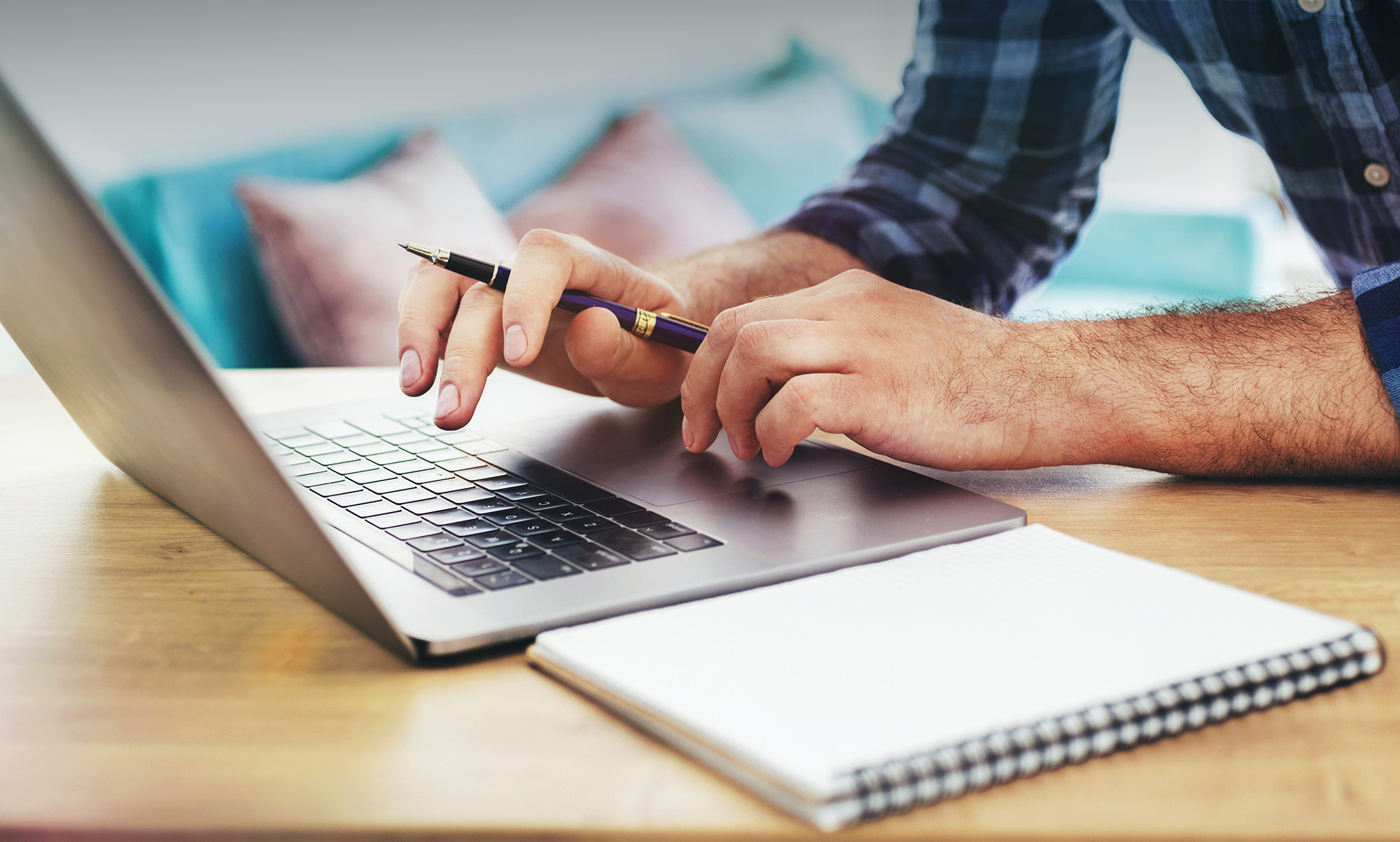 Person typing on laptop