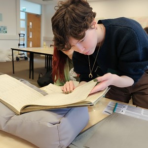 Student reading archive