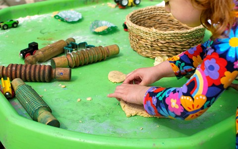 Helping Hands Nursery Child with Playdough