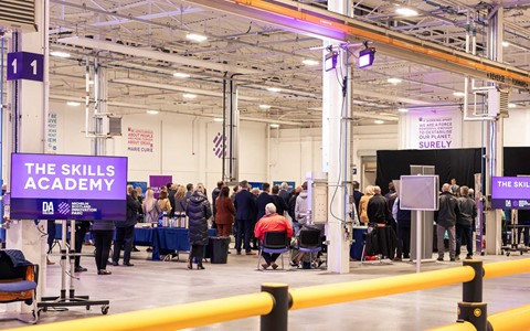 Wide shot of audience listening to presentation at the Skills Academy