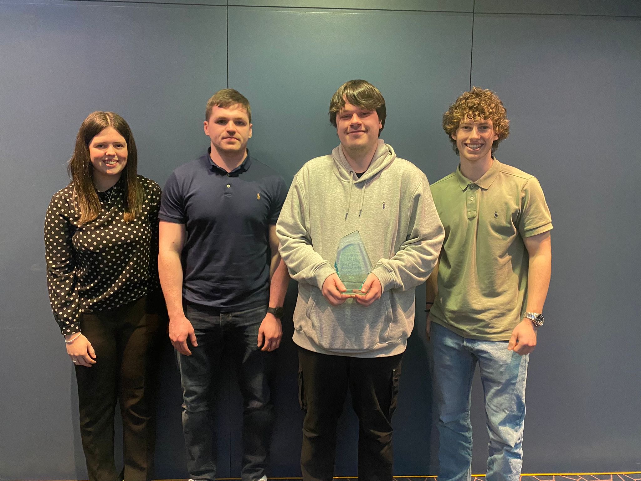 Group of students holding trophy for CIOB competition