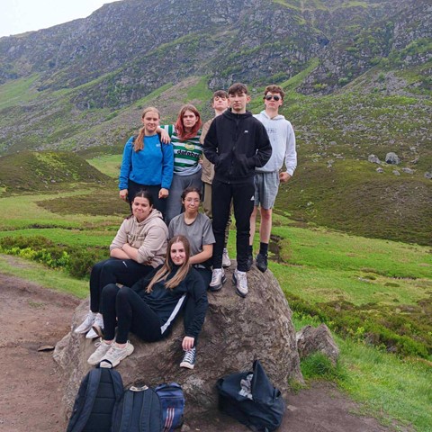 LEAP students outdoors in front of hill