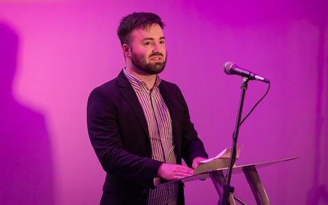Student Bradley giving speech