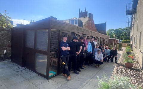 Construction Craft students in front of the animal pens they built at the Arbroath Campus 