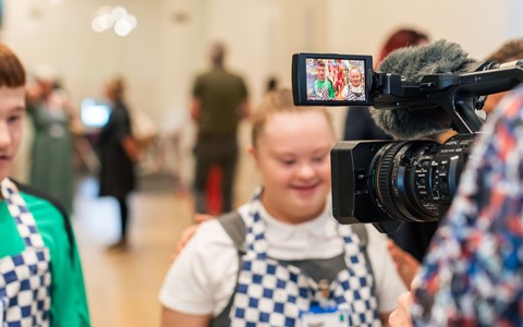 Georgia and Josh being interviewed by STV News