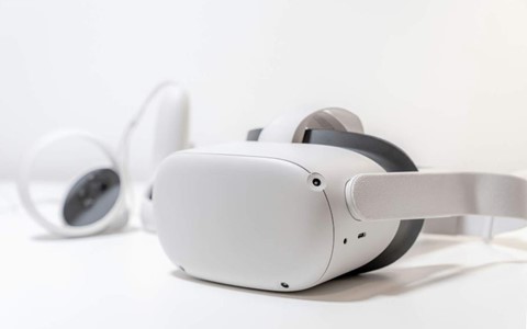 Virtual reality headset and controller on a desktop