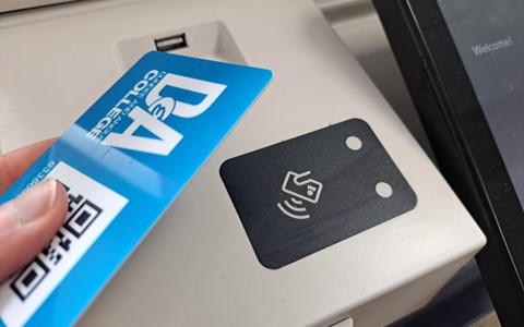 student ID card on a printer scanner