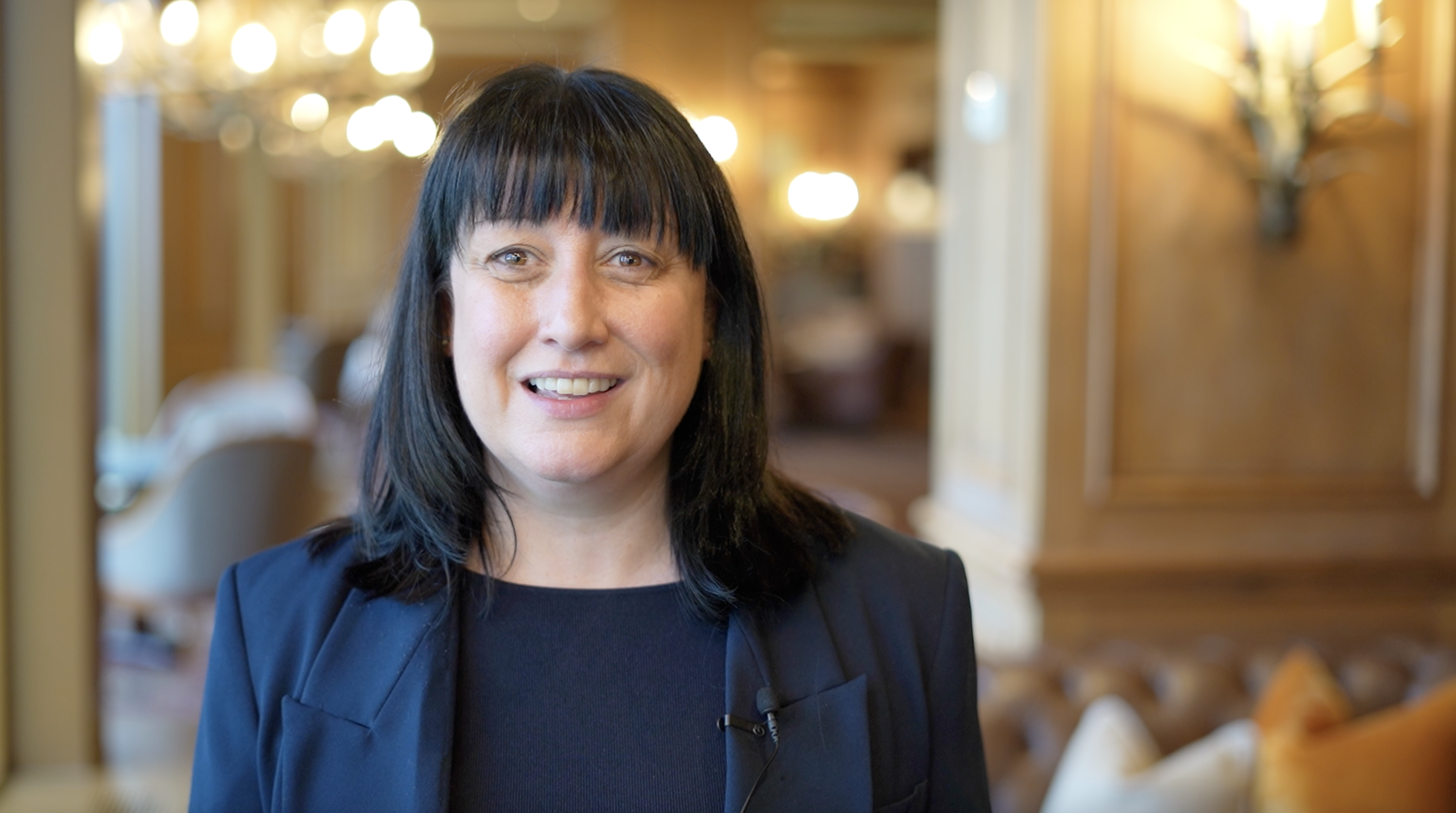 image of a woman manager from old course hotel st andrews smiling