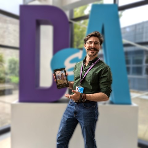 Jonathan Liddell holding book