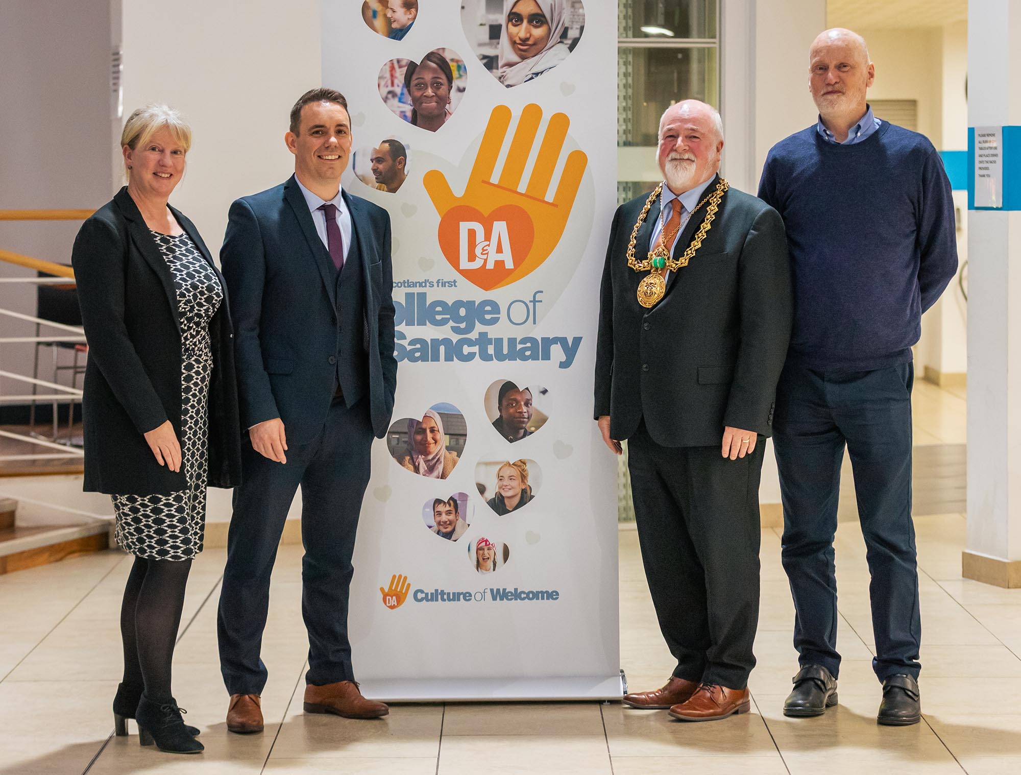 Shona Robison, Cabinet Secretary for Finance and Local Government, Simon Hewitt, Dundee and Angus College Principal, Bill Campbell, Dundee's Lord Provost, and Laurie O'Donnell, Board of Management Chair at Dundee and Angus College )