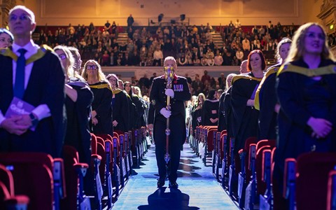 2024 graduation - platform party arriving in Caird Hall