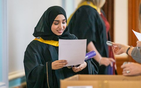 2024 graduation - student receiving certificate