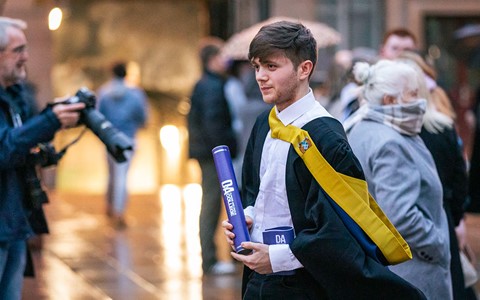 2024 graduation - graduates and guests outside Caird Hall