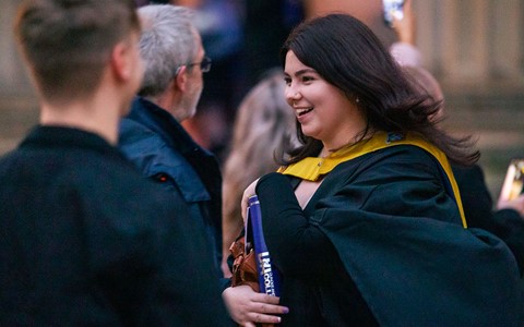 2024 graduation - graduates and guests outside Caird Hall